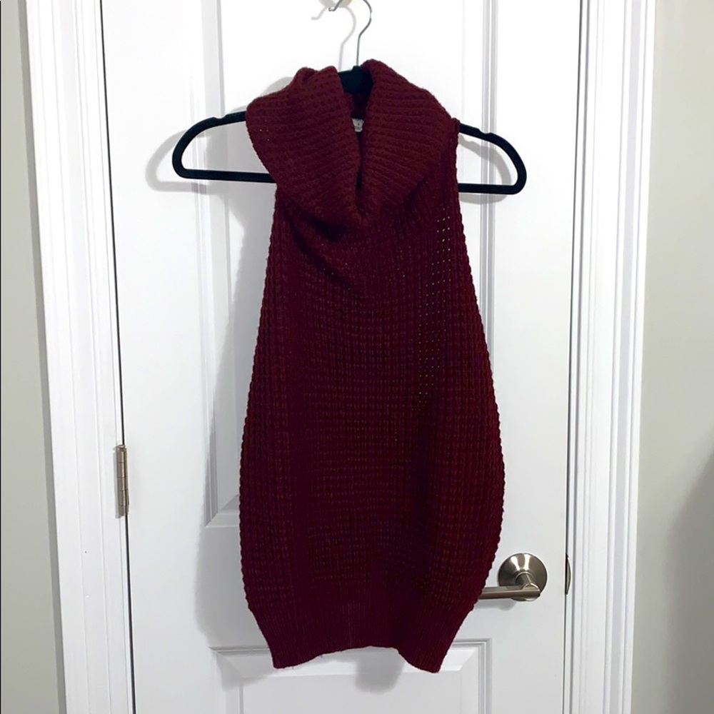 Turtle neck sleeveless sweater with open back